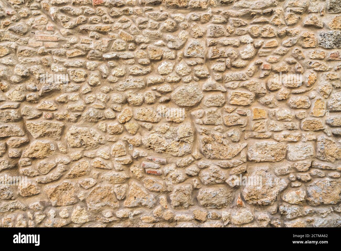 Parete in pietra a vista sfondo, modello, struttura in Toscana. Italia Foto Stock
