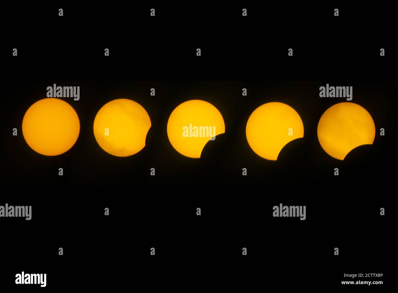 Sequenza DI un Eclipse solare parziale Foto Stock