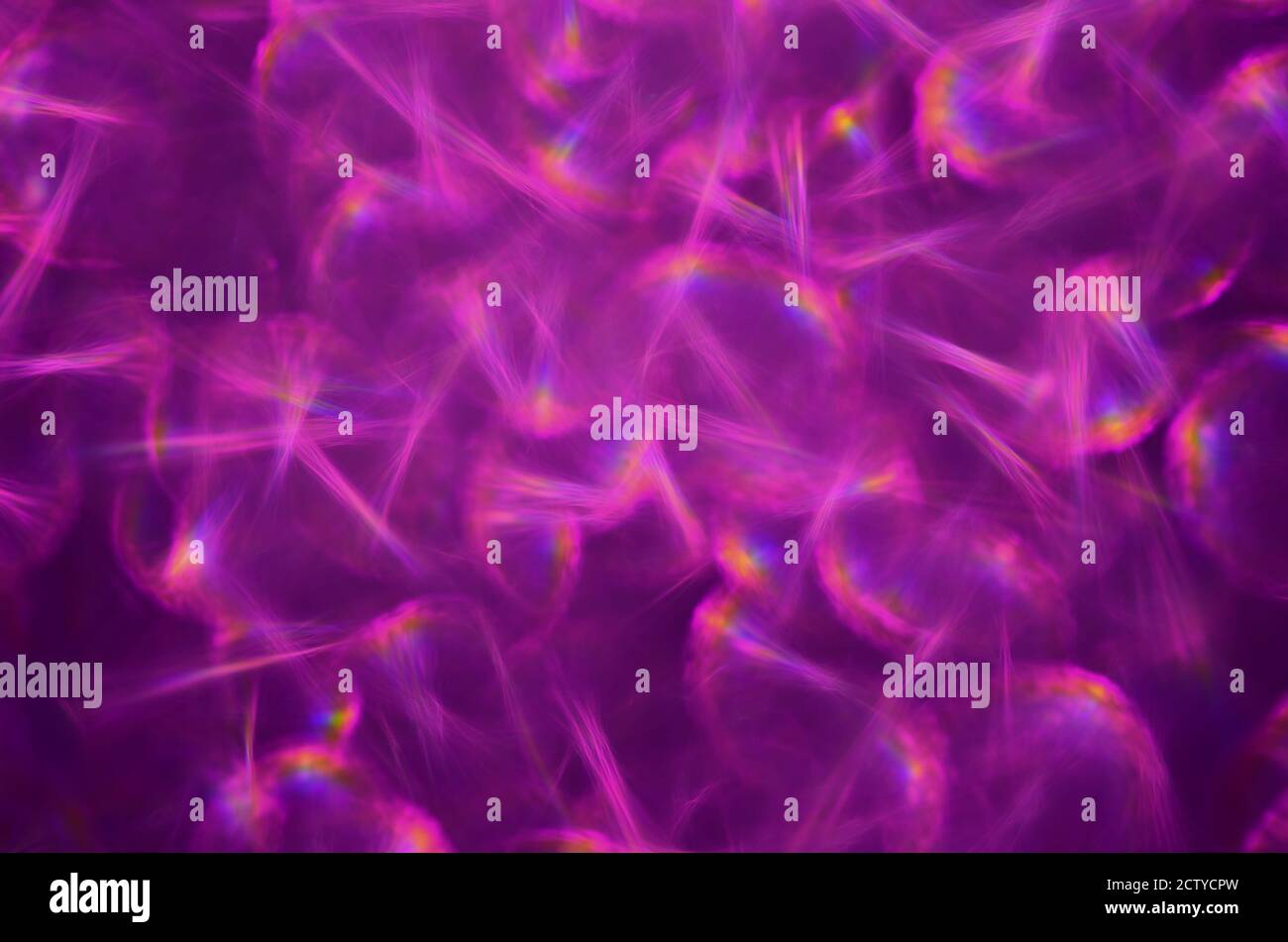 Sfondo astratto tremolante con luce viola sfocata. Foto Stock