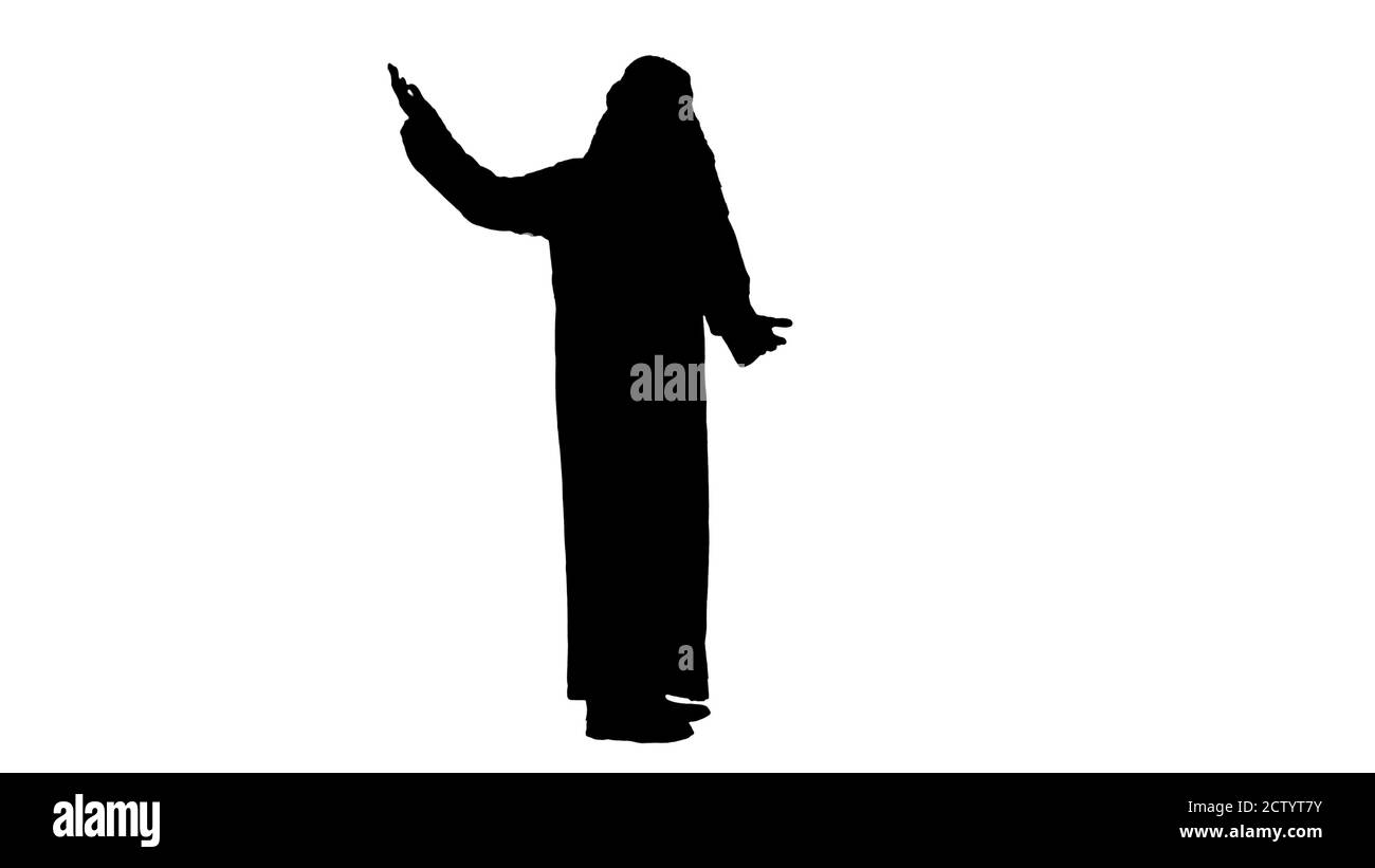 Uomo arabo che indossa il keffiyeh facendo il gesto di benvenuto, canale alfa Foto Stock