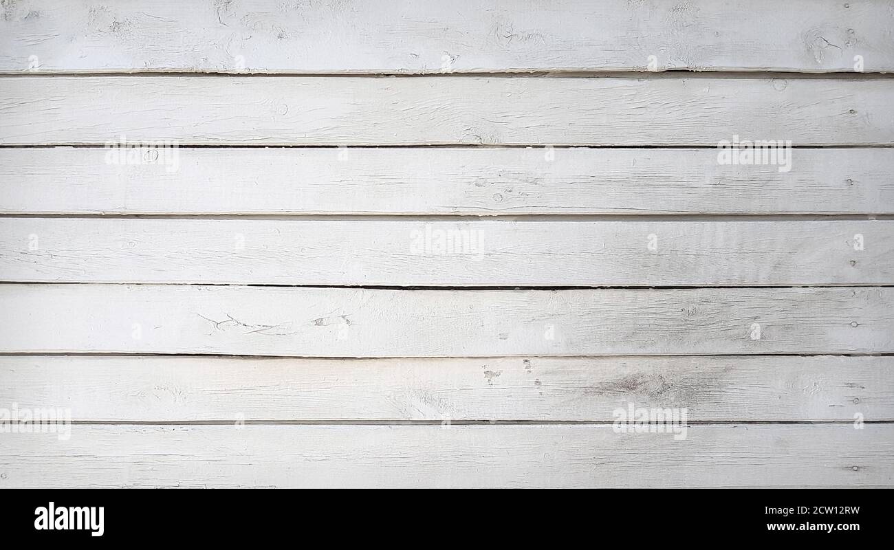 Struttura bianca e nera di tavole di legno vergini. Primo piano Foto Stock