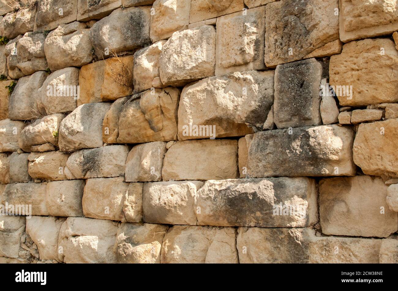 Pietre grandi pietra arenaria antica muratura asciutta closeup muro come pietra sfondo Foto Stock