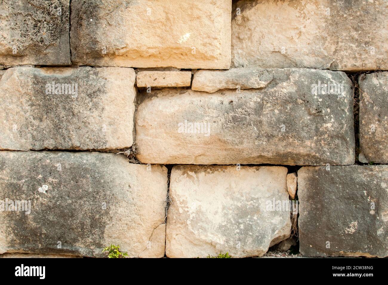 Pietre grandi pietra arenaria antica muratura asciutta closeup muro come pietra sfondo Foto Stock