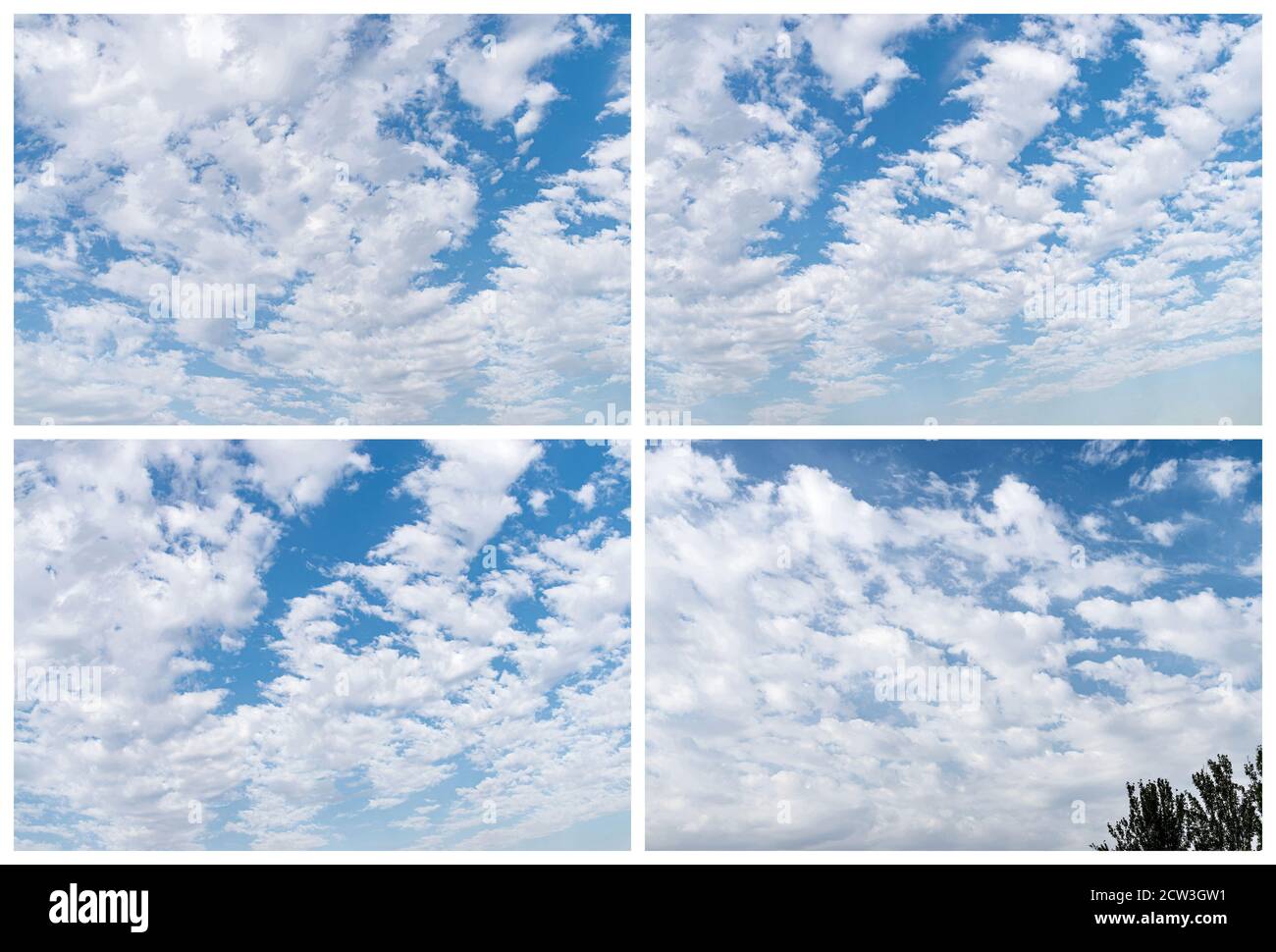 Raccolta di nuvole bianche su sfondo blu in giorno Foto Stock