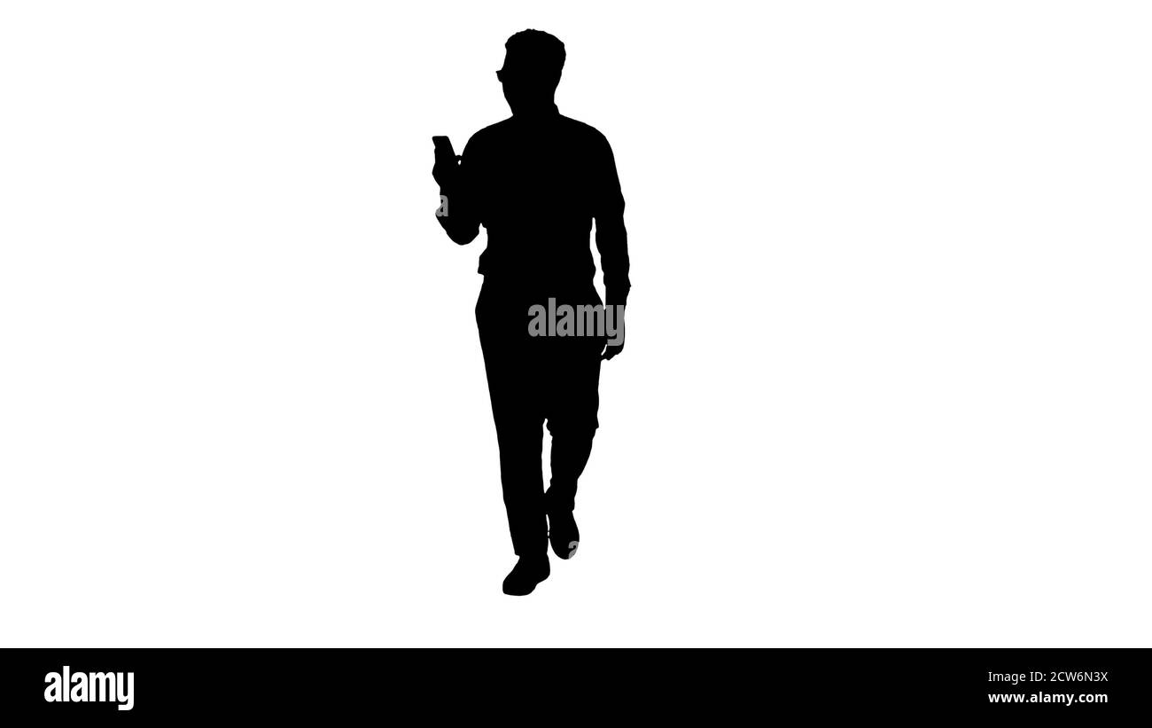 Silhouette sorridente uomo d'affari afroamericano che fa video cal Foto Stock