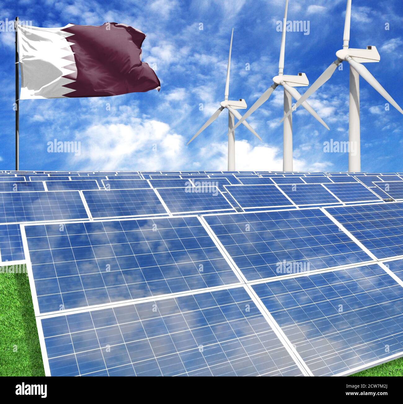 Pannelli solari sullo sfondo di un flagpole con il Bandiera del Qatar e turbina eolica Foto Stock