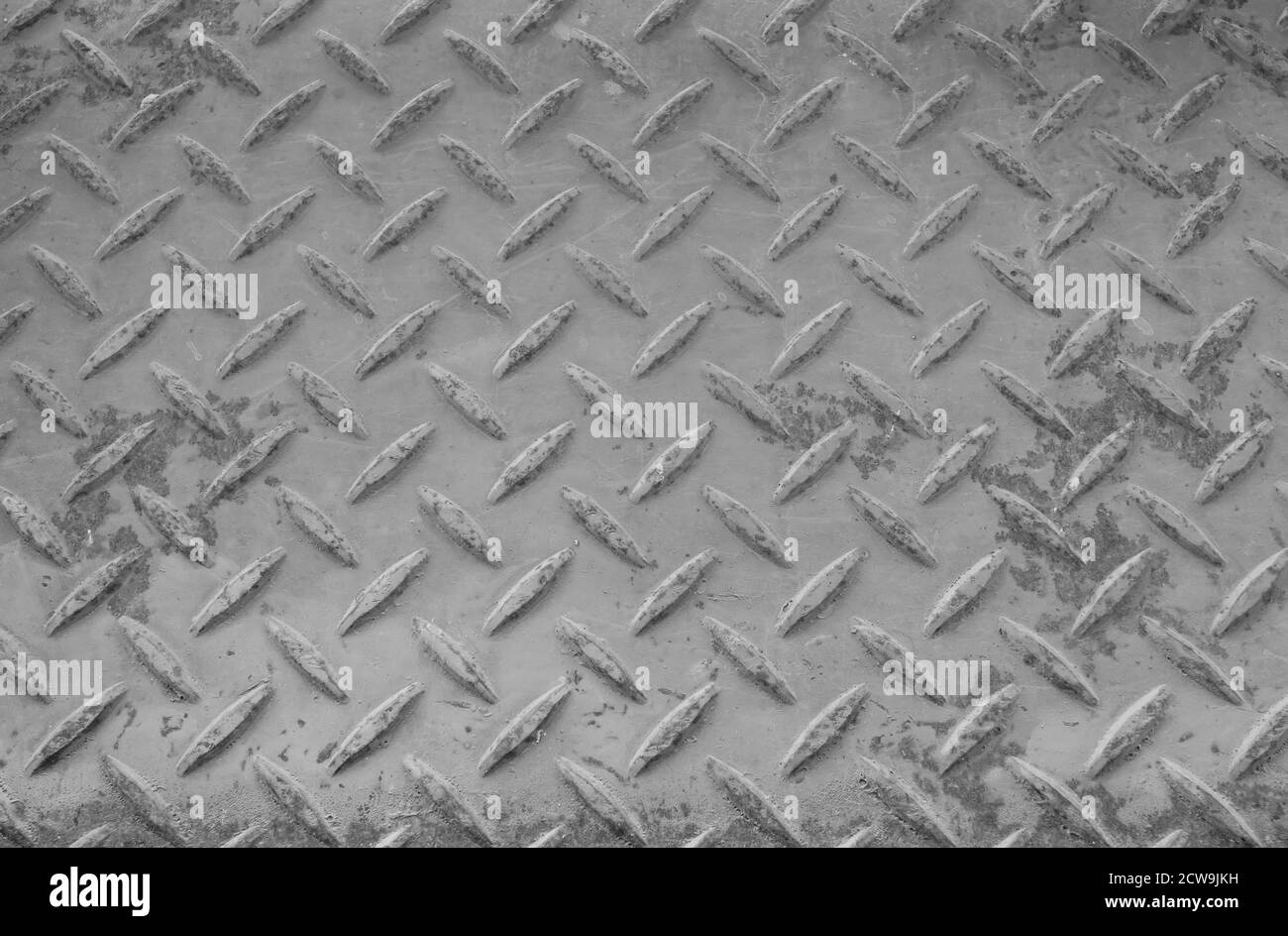 Superficie arrugginita della vecchia piastra a scacchi Foto Stock