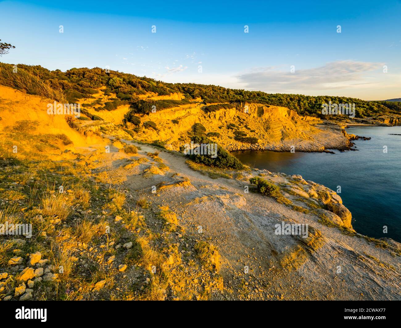 Dawn Light marlee terziarie e arenarie della spiaggia di Lopar Sull'isola di Rab Croazia Europa Foto Stock