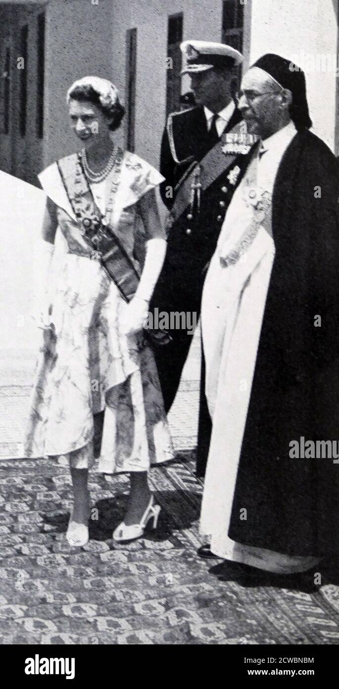 La regina Elisabetta II e il principe Filippo, visitarono la Libia nel 1954. Si recarono a Tobruk (durante la sua seconda visita di stato) per incontrare Idris, il primo e unico Re di Libia Foto Stock