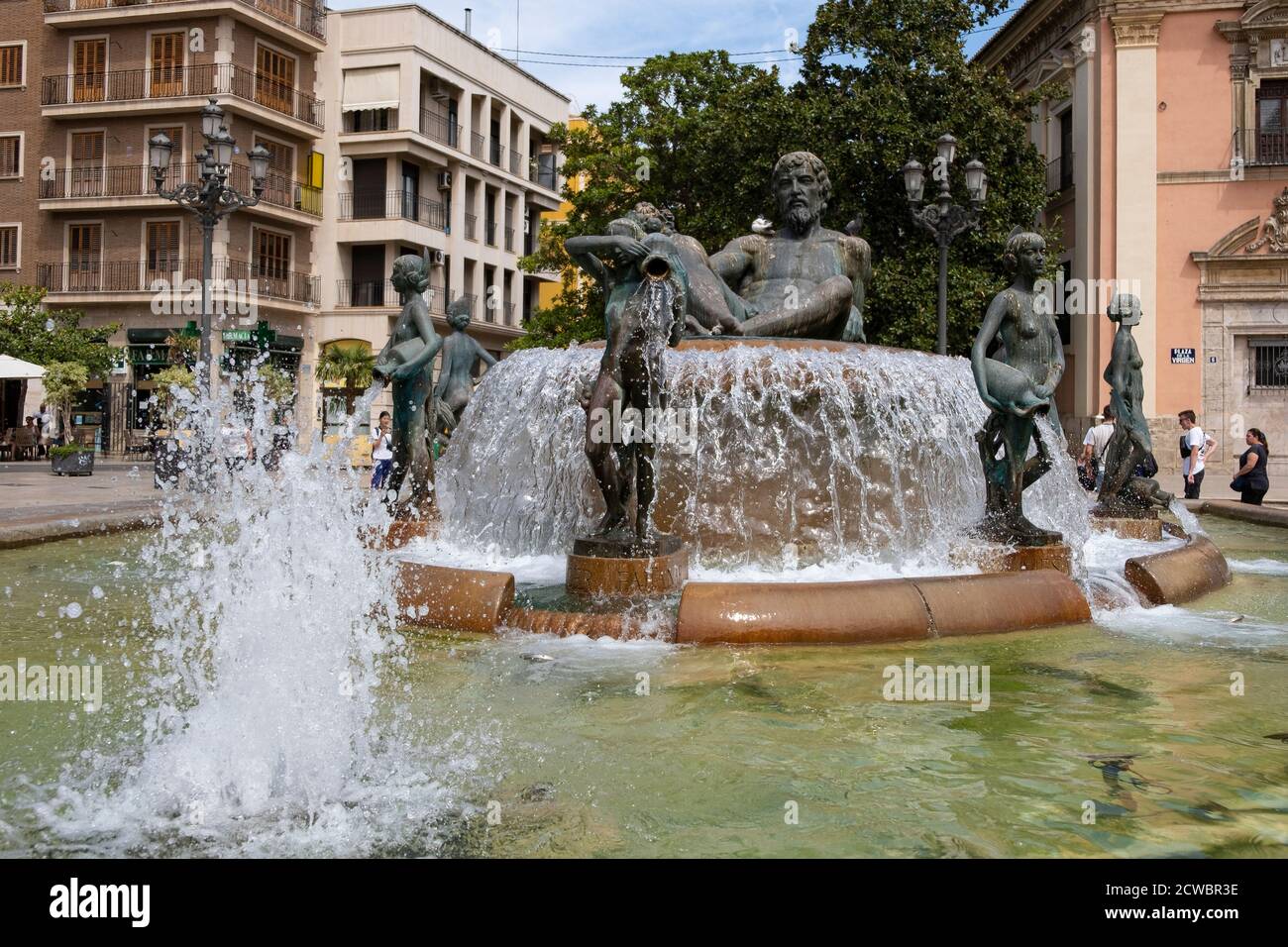 VALENCIA / SPAGNA - 07 AGOSTO 2019: Plaza de la Virgen, Fontana di Turia. Nettuno seduto sopra le vergini che rappresentano, allegoricamente, i canali fe Foto Stock