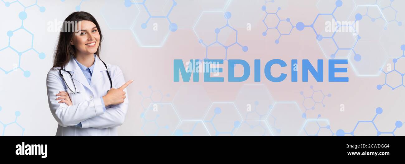 Felice dottore che punta all'iscrizione della medicina Foto Stock