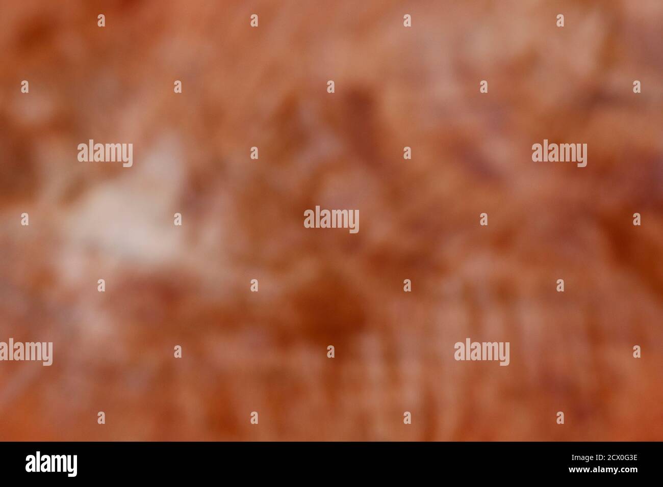 sfondo astratto sfocato in sfumature di rosso Foto Stock