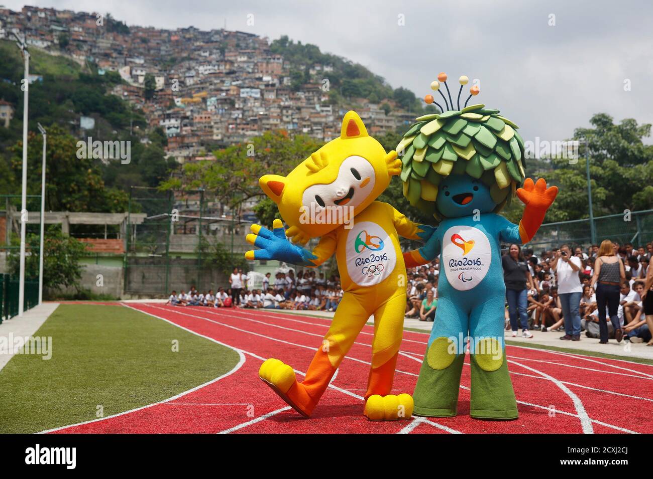 The Unnamed Mascots Of The Rio 16 Olympic L And Paralympic Games Are Pictured With The Morro Dos Prazeres Slum In The Background During Its Presentation In Rio De Janeiro November 24