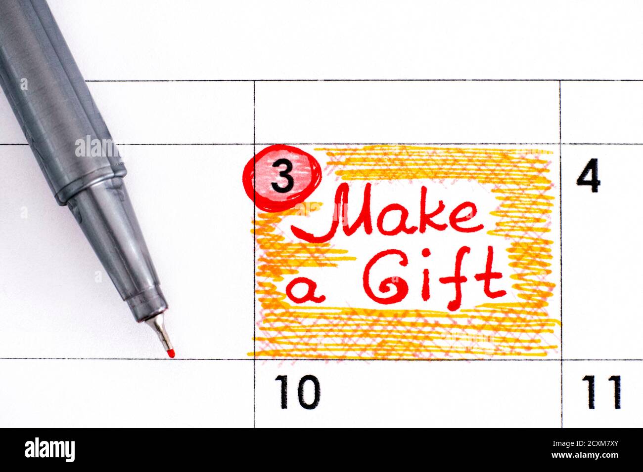 Promemoria Crea un giorno regalo in calendario con la penna. Dicembre 03. Foto Stock
