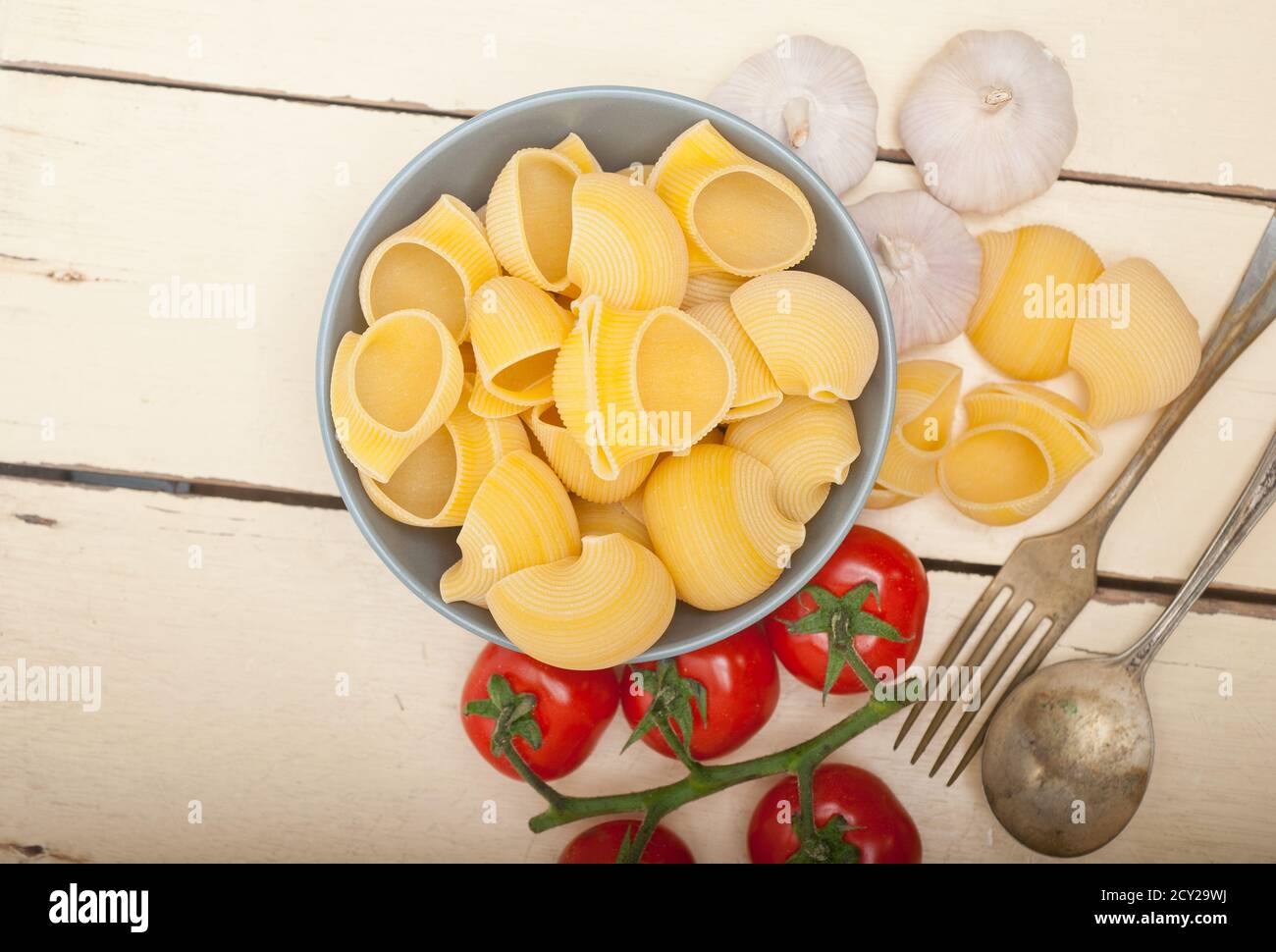 Lumaca italiana lumaconi pasta con ciliegia matura il sugo di pomodoro ingredienti Foto Stock