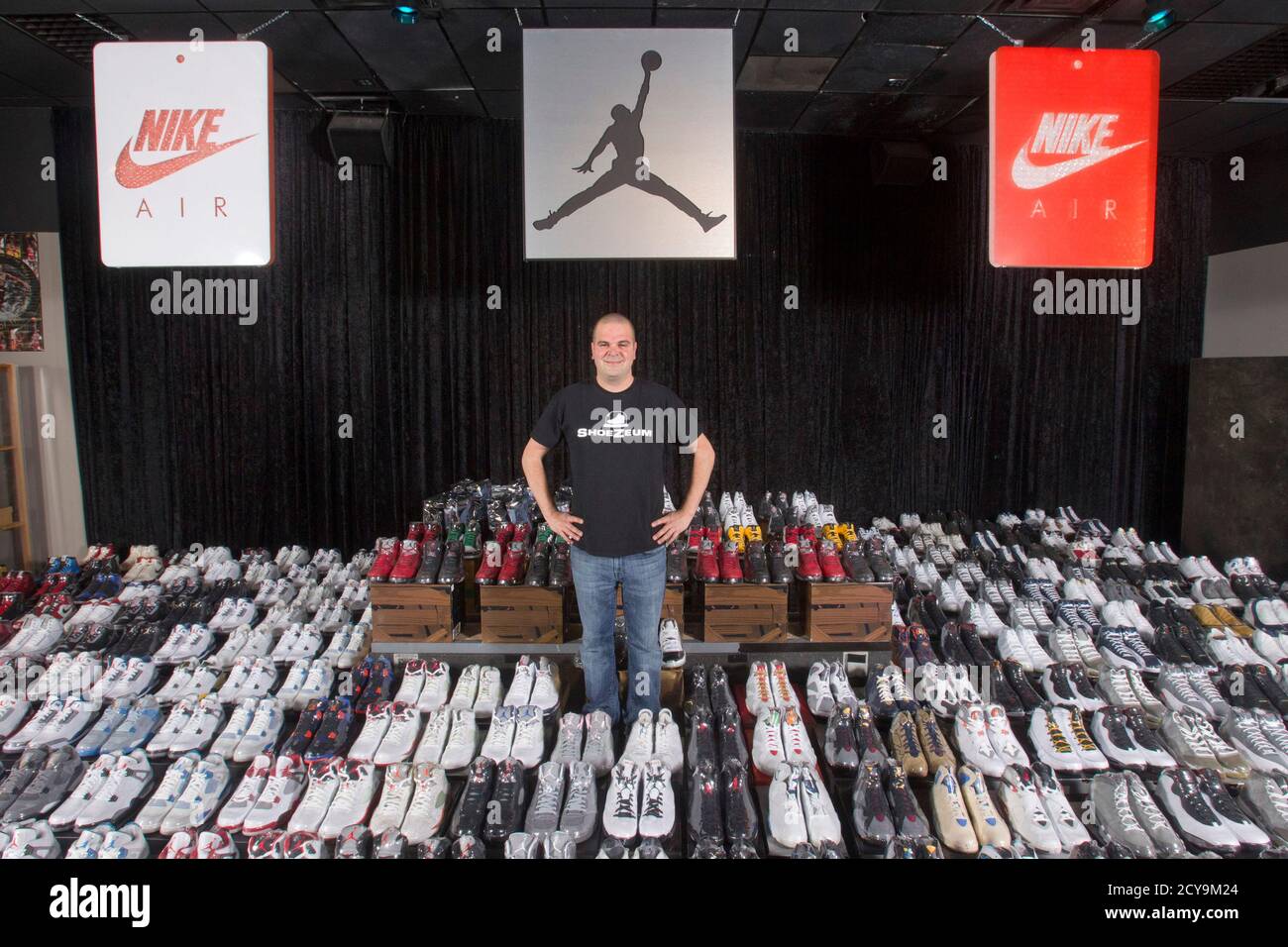 Jordan Michael Geller poses with his collection of the Nike Air Jordan Retro  line at the 