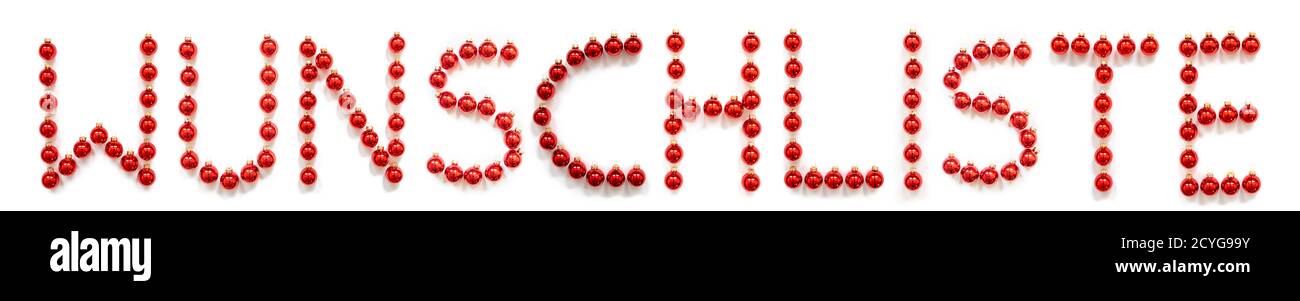 Red Christmas Ball Ornament Building Word Wunschliste significa Wish List Foto Stock