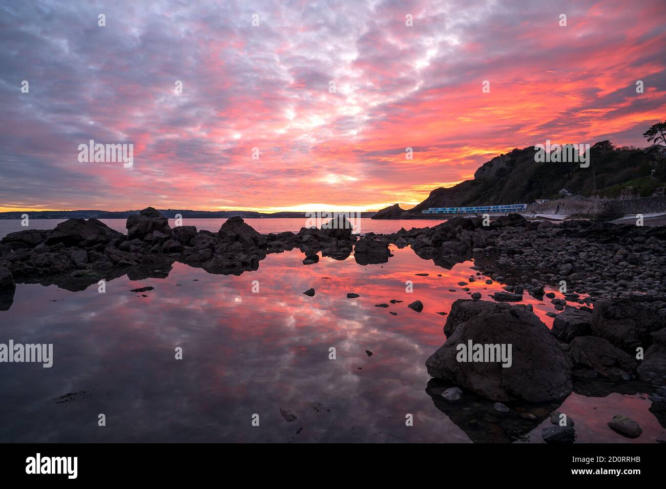 Meadfoot Beach Tramonto, Torquay Foto Stock