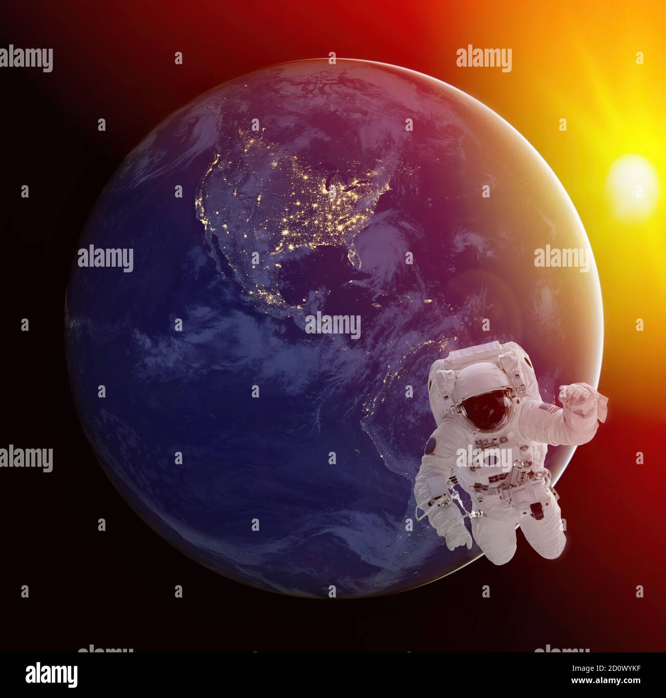 Astronauta che cammina nello spazio con la terra a sfondo notturno. Elementi di questa immagine forniti dalla NASA. Foto Stock