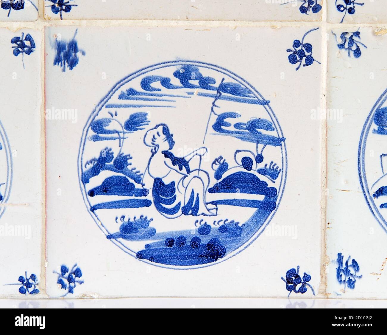 Tegola Delft blu e bianca con la pittura di a. pastore e pecora Foto Stock