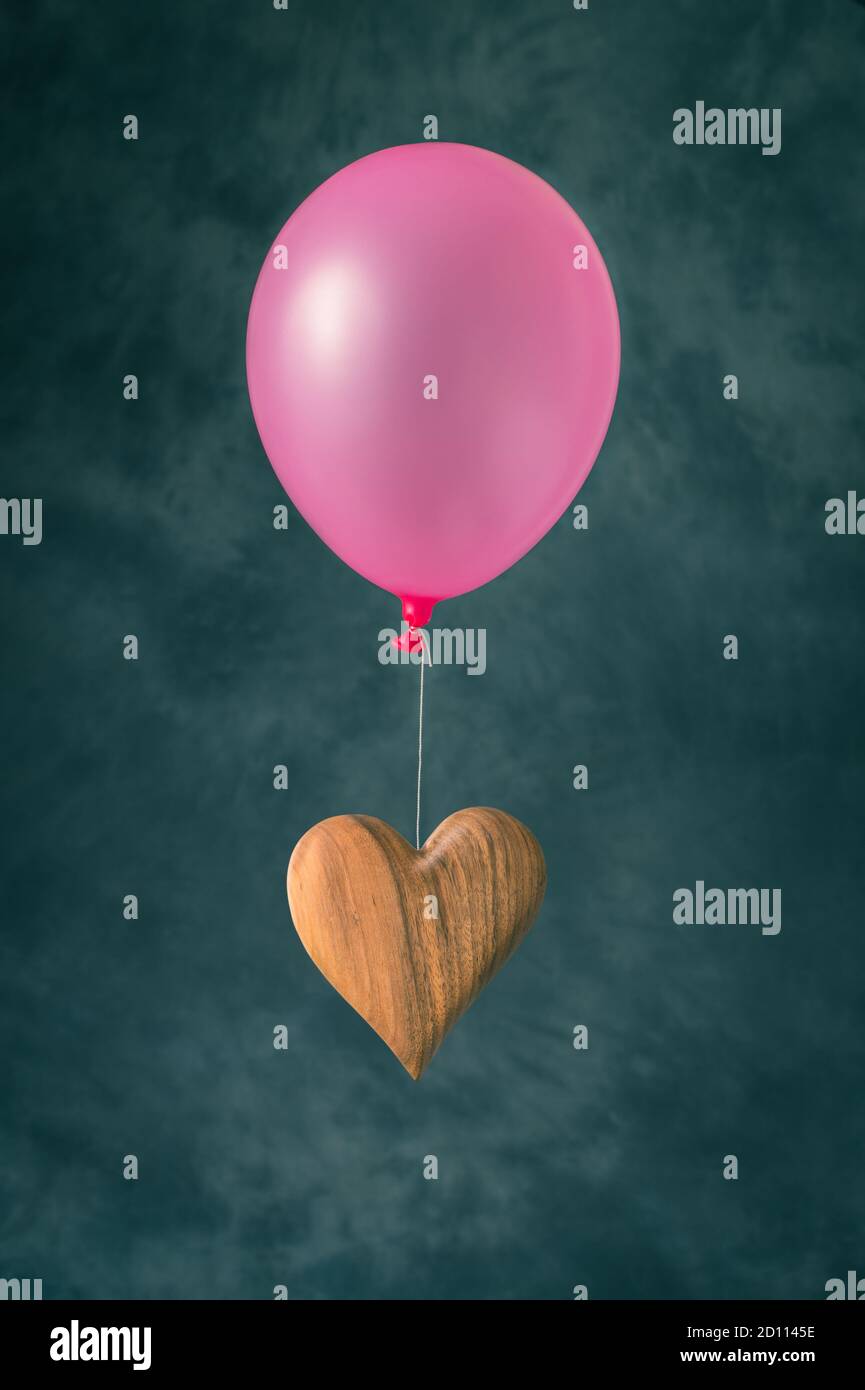 Palloncino cuore volante Foto Stock