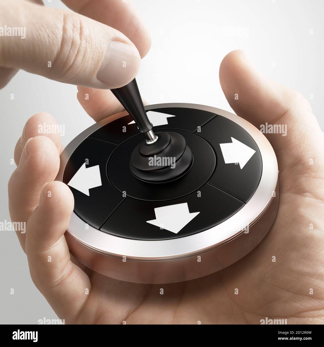 Uomo che usa un joystick concettuale per cambiare direzione. Concetto di orientamento strategico. Immagine composita tra una fotografia a mano e uno sfondo 3D. Foto Stock