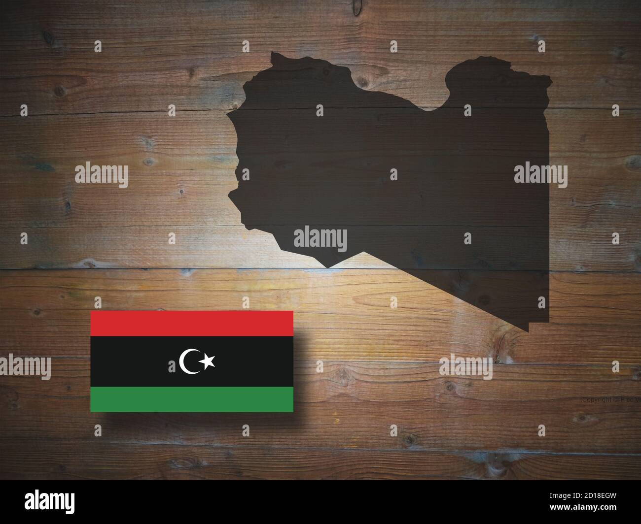 Mappa e bandiera della Libia, su sfondo ligneo, illustrazione 3D Foto Stock