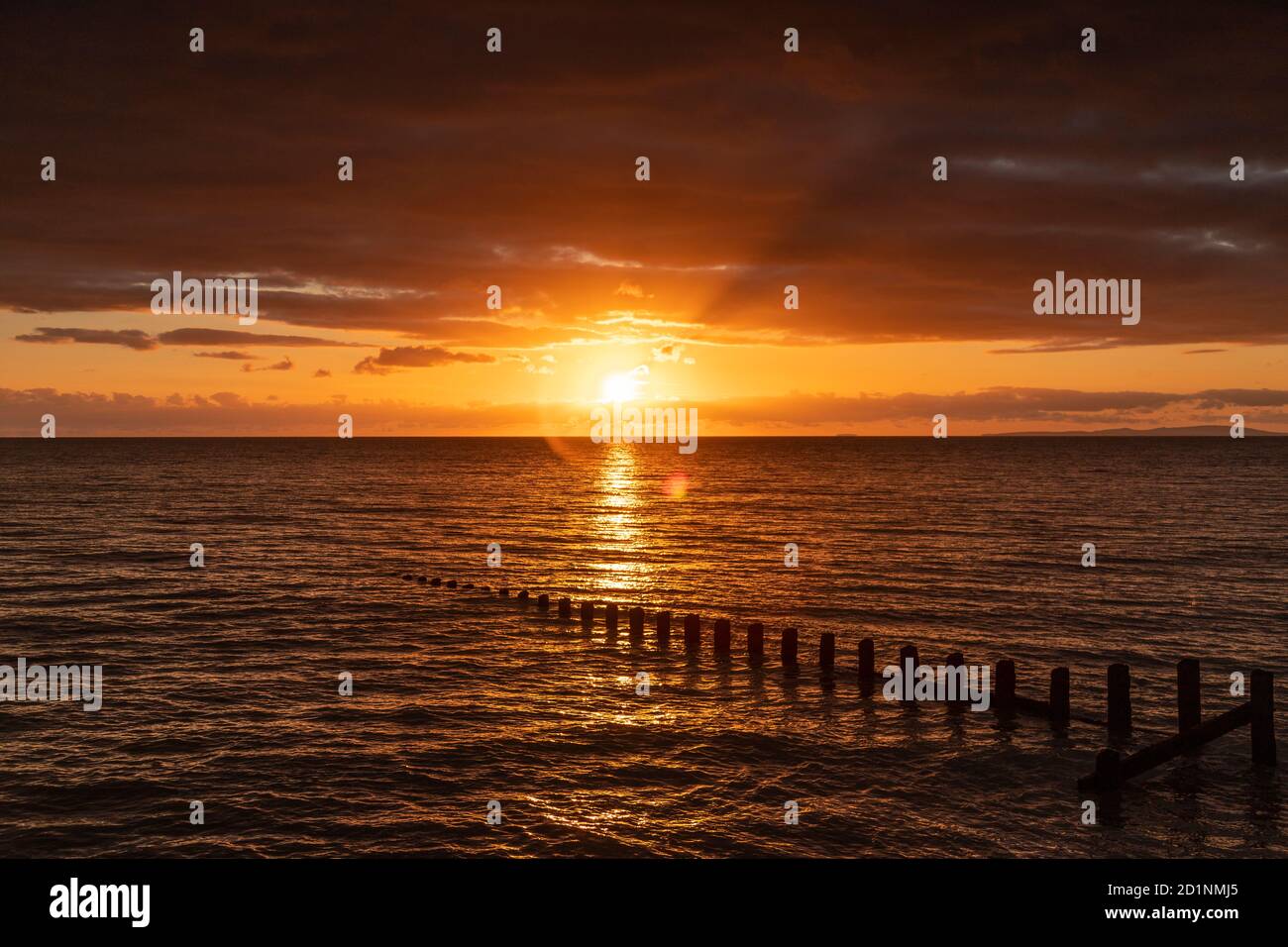 Tramonto a Barmouth sulla costa del Galles Foto Stock