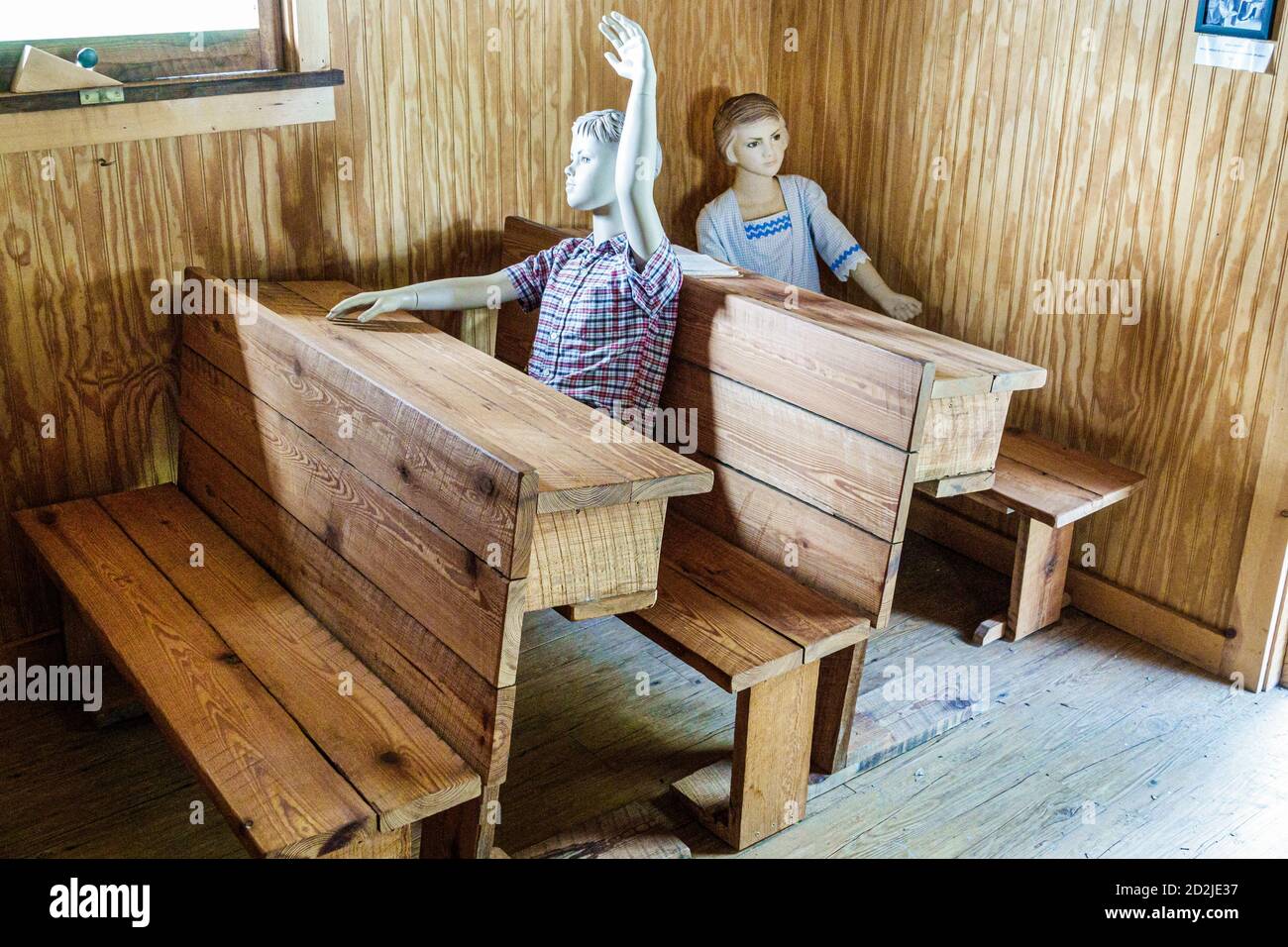 Clermont Florida,Historic Village Museum,Herring Hooks Schoolhouse,replica,interno di una stanza,banchi scuola,manichino,visitatori viaggio tou tour Foto Stock