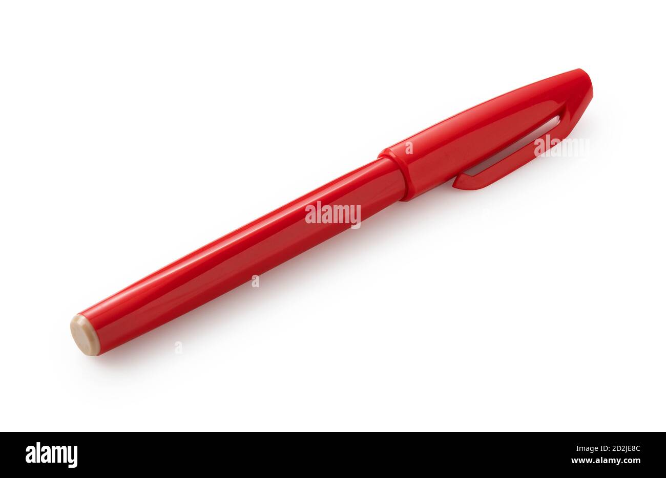Penna rossa su sfondo bianco Foto Stock