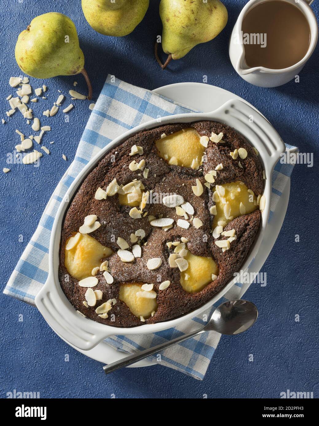 Budino di pera e cioccolato. Foto Stock