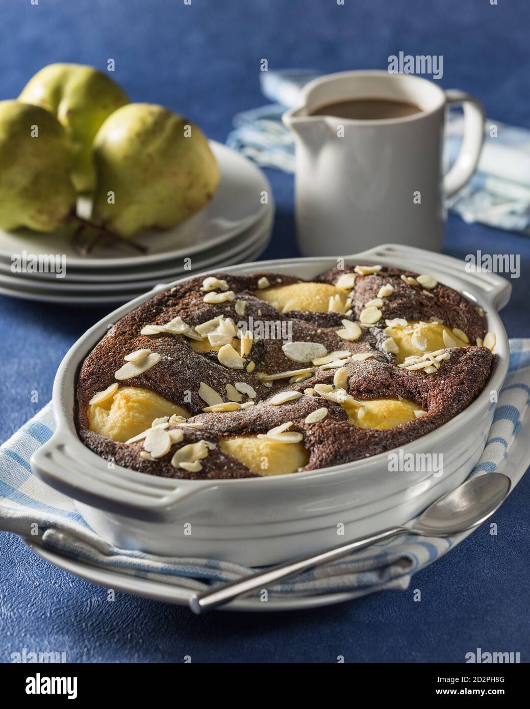 Budino di pera e cioccolato. Foto Stock