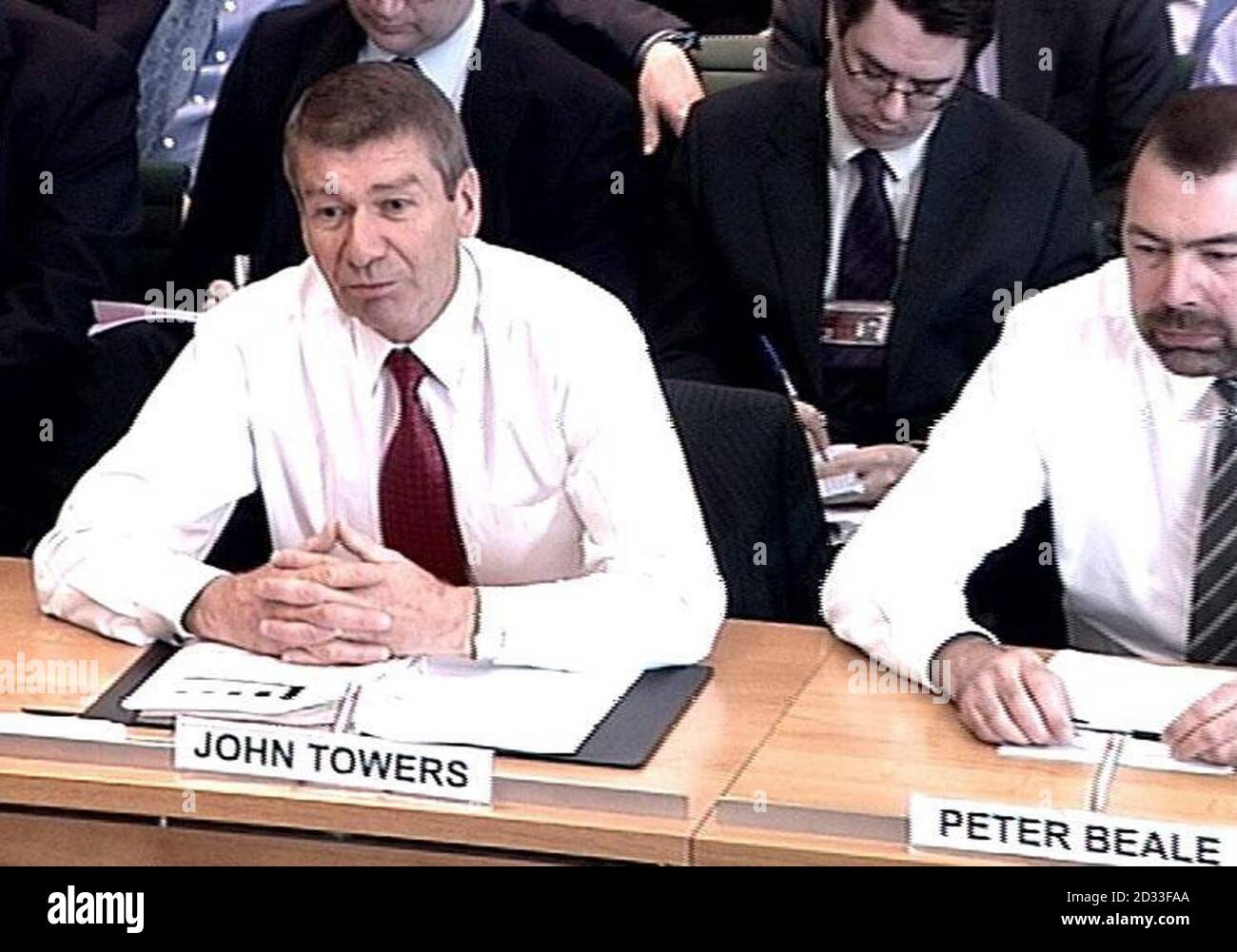 John Towers (a sinistra) e Peter Beale, rispettivamente presidente e vicepresidente dei produttori di automobili Rover, dando prova, al Comitato di selezione del Commercio e dell'industria della Camera dei Comuni che stava indagando nel settore automobilistico britannico. Foto Stock