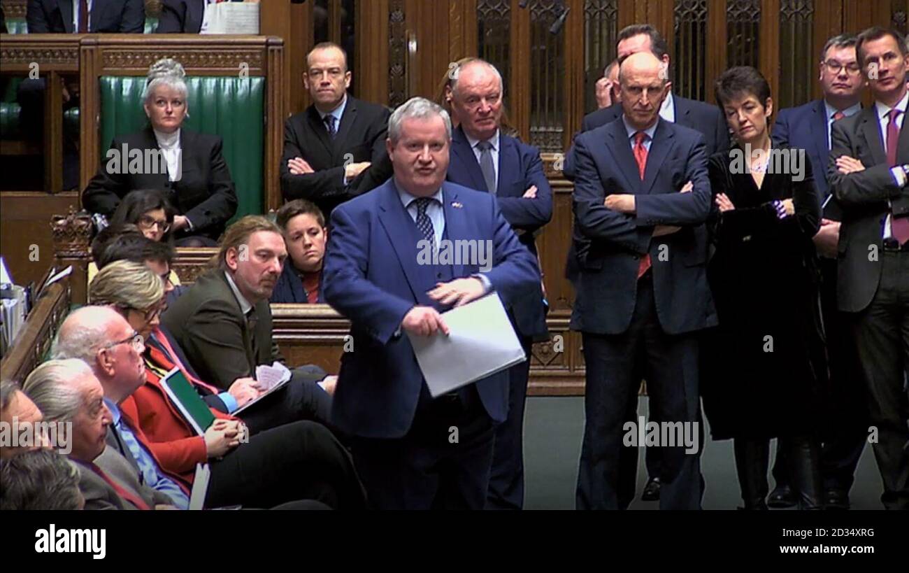 Il leader della SNP Westminster Ian Blackford risponde dopo che il primo ministro Theresa May ha fatto una dichiarazione ai parlamentari della Camera dei Comuni, Londra, sulla sua nuova mozione Brexit. Foto Stock