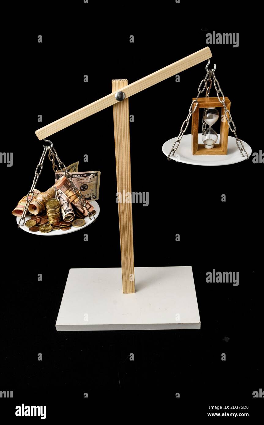 Orologio e valuta il tempo è denaro Concept Foto Stock