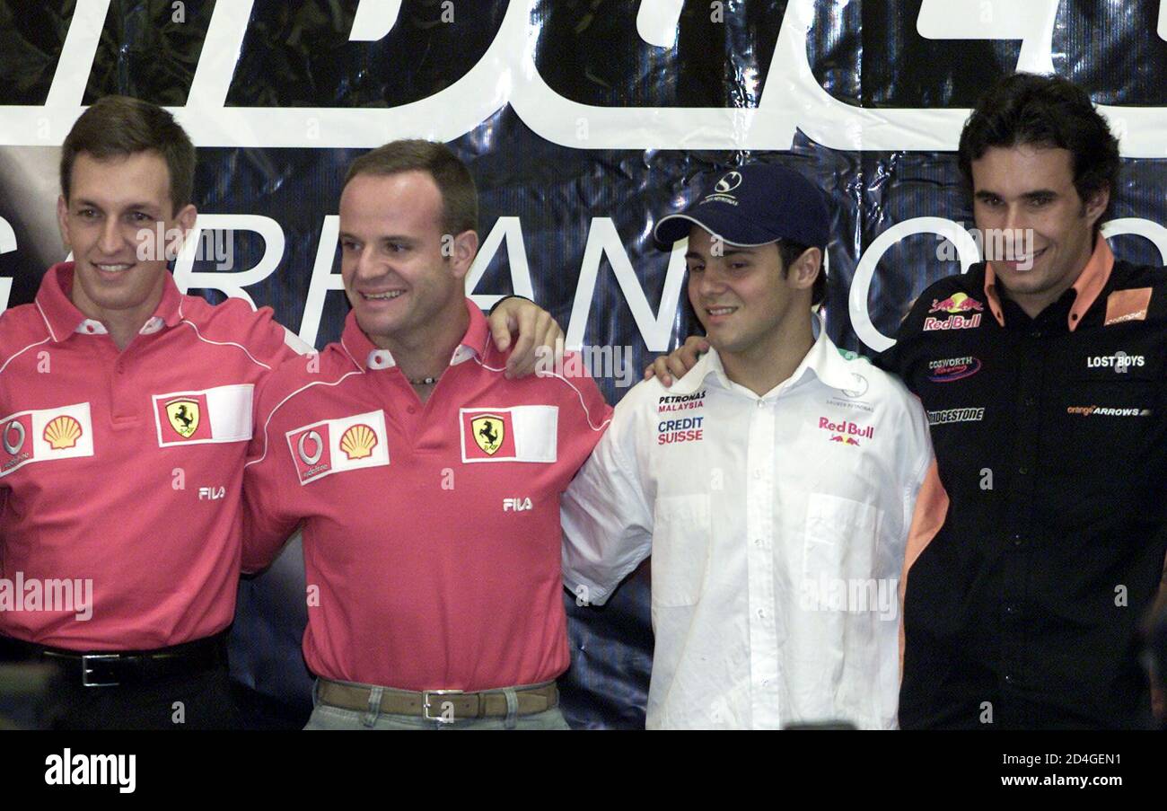 L-R) i piloti brasiliani di Formula uno Luciano Burti Ferari, il  collaudatore della Ferrari Rubens Barrichello, Felipe massa di Sauber ed  Enrique Bernoldi frecce si pongono ai fotografi dopo una conferenza stampa