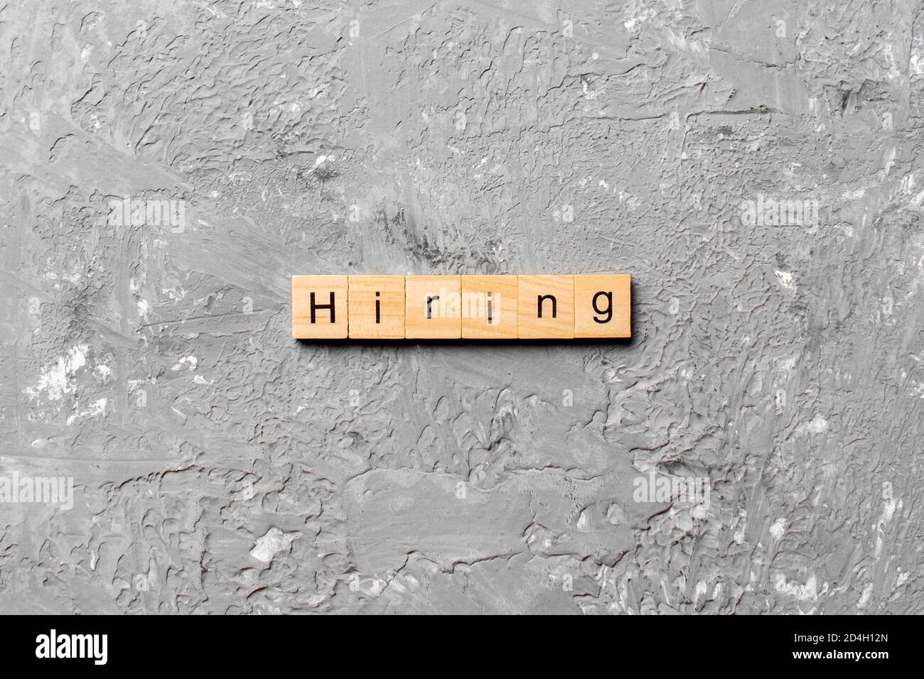 Affitto parola scritta sul blocco di legno. affitto testo sul tavolo, concetto. Foto Stock