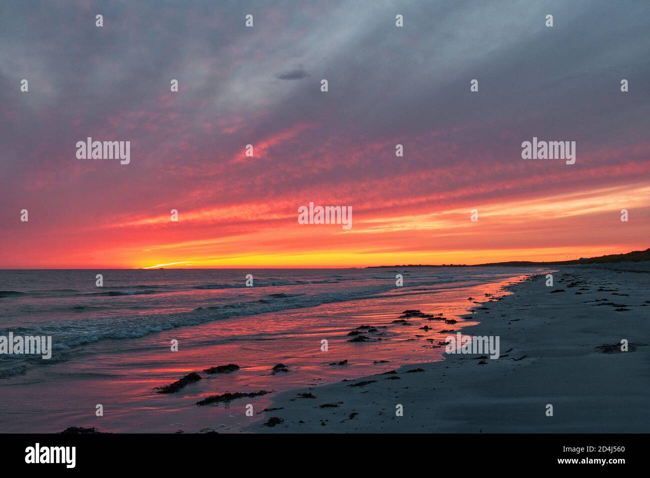 Tramonto sulla spiaggia su South Uist, Ebridi esterne, Scozia, Regno Unito Foto Stock