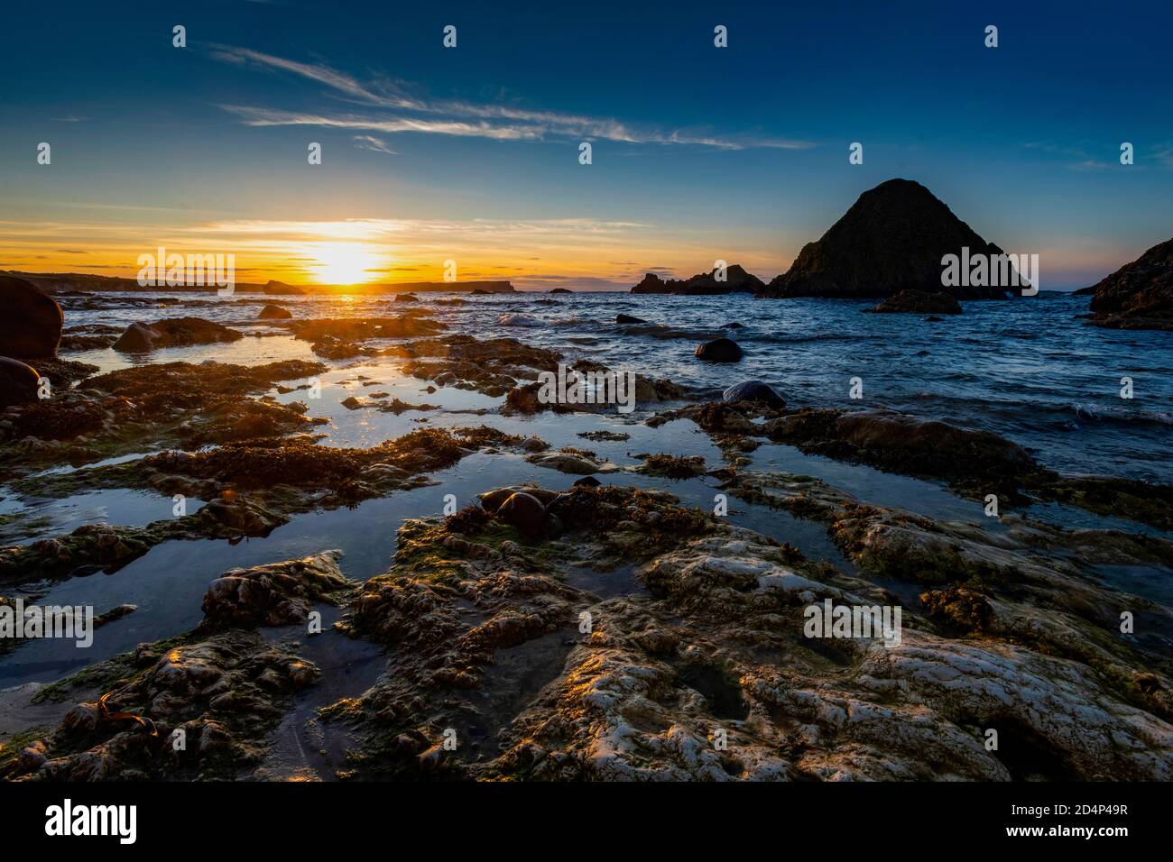 Tramonto a Ballintoy, White Park Bay, County Antrim, Irlanda del Nord Foto Stock