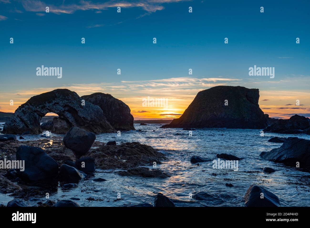 Tramonto a Ballintoy, White Park Bay, County Antrim, Irlanda del Nord Foto Stock