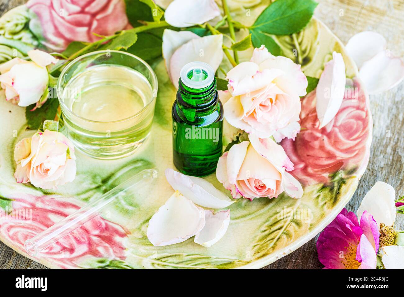 Rose olio essenziale. Foto Stock