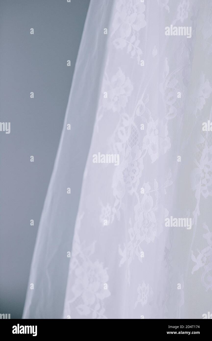 Primo piano di dettagli in pizzo su un abito da sposa o velo. Foto Stock