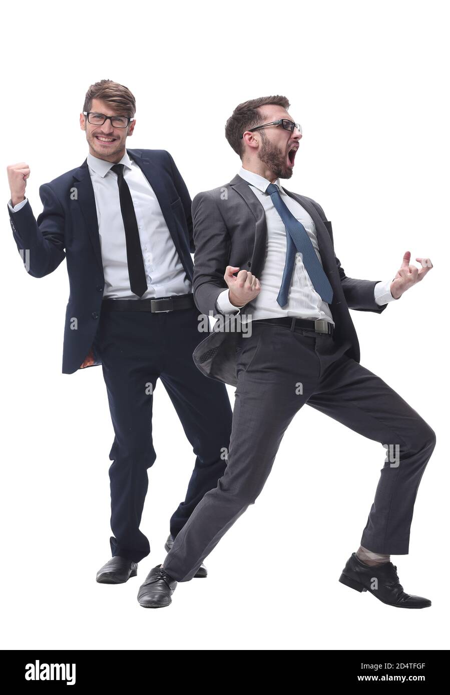 Giovane uomo d'affari cordiale seduto alla sua scrivania Foto Stock