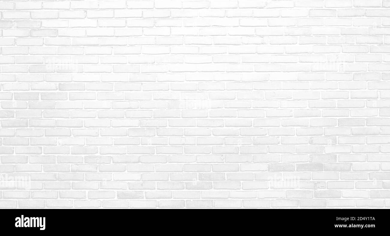 Muro in mattoni bianco chiaro con evidenziazioni e ombreggiature in un grana ruvida Foto Stock