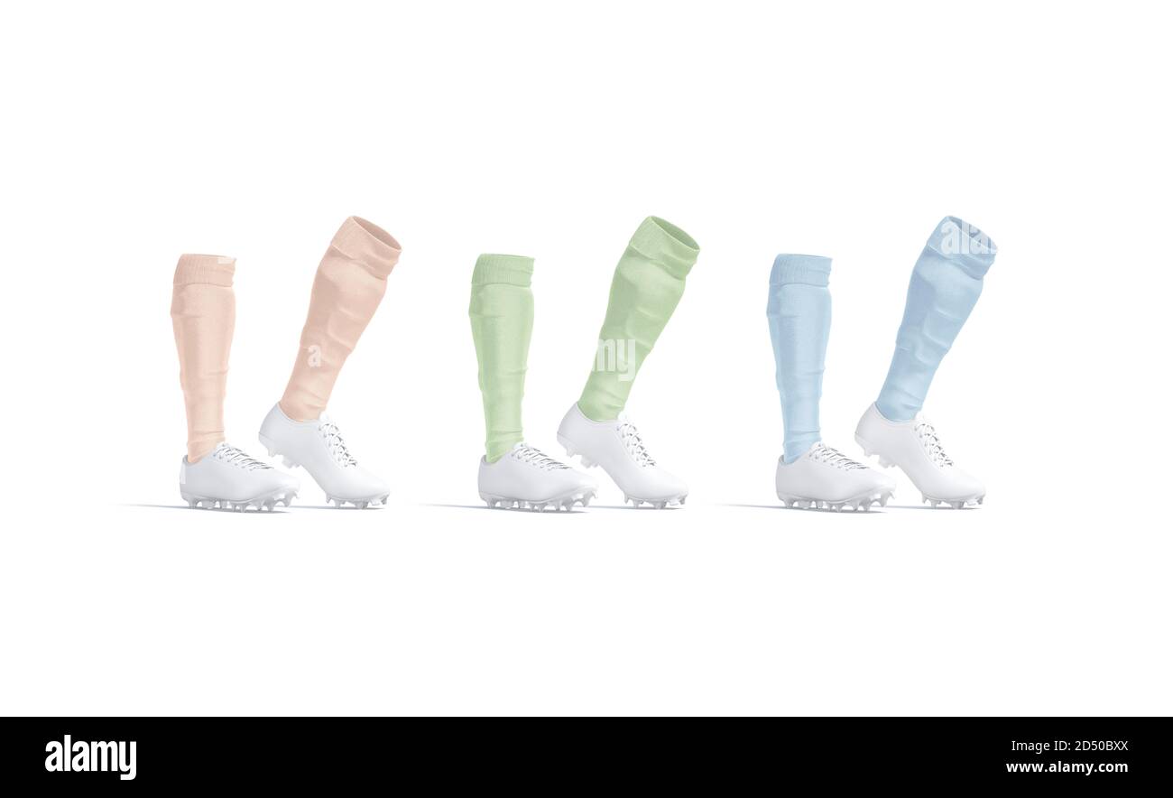 Stivali da calcio bianchi bianchi bianchi con calze colorate mockup su punta di piede Foto Stock