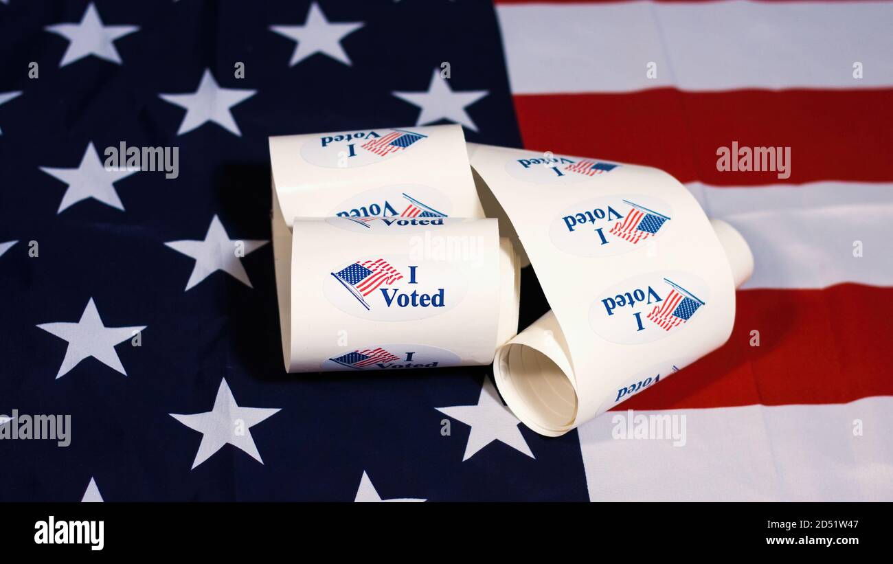 Ho votato adesivi per le elezioni americane sulla bandiera degli Stati Uniti. Foto Stock