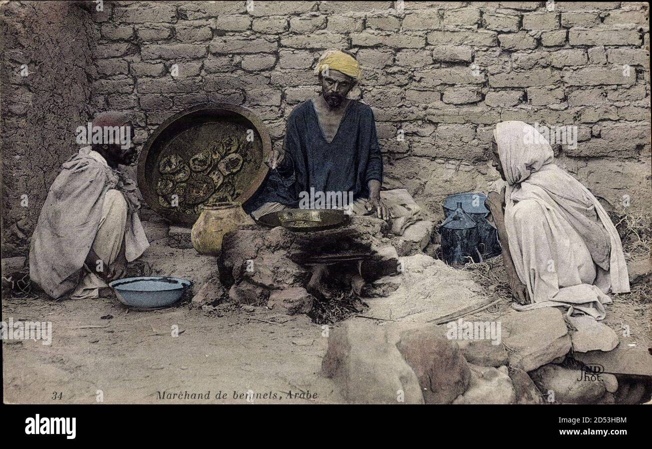 Marchand de beignets, Arabe, Händler, Maghreb, sitzende Männer | utilizzo in tutto il mondo Foto Stock
