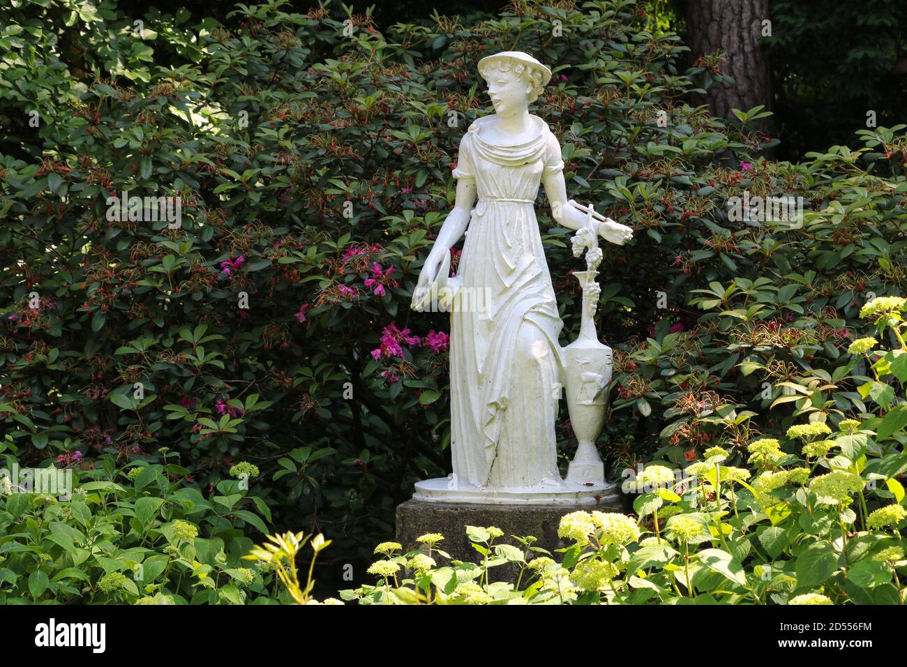 Donna giardino scultura in giardino botanico di Monaco Germania Foto Stock