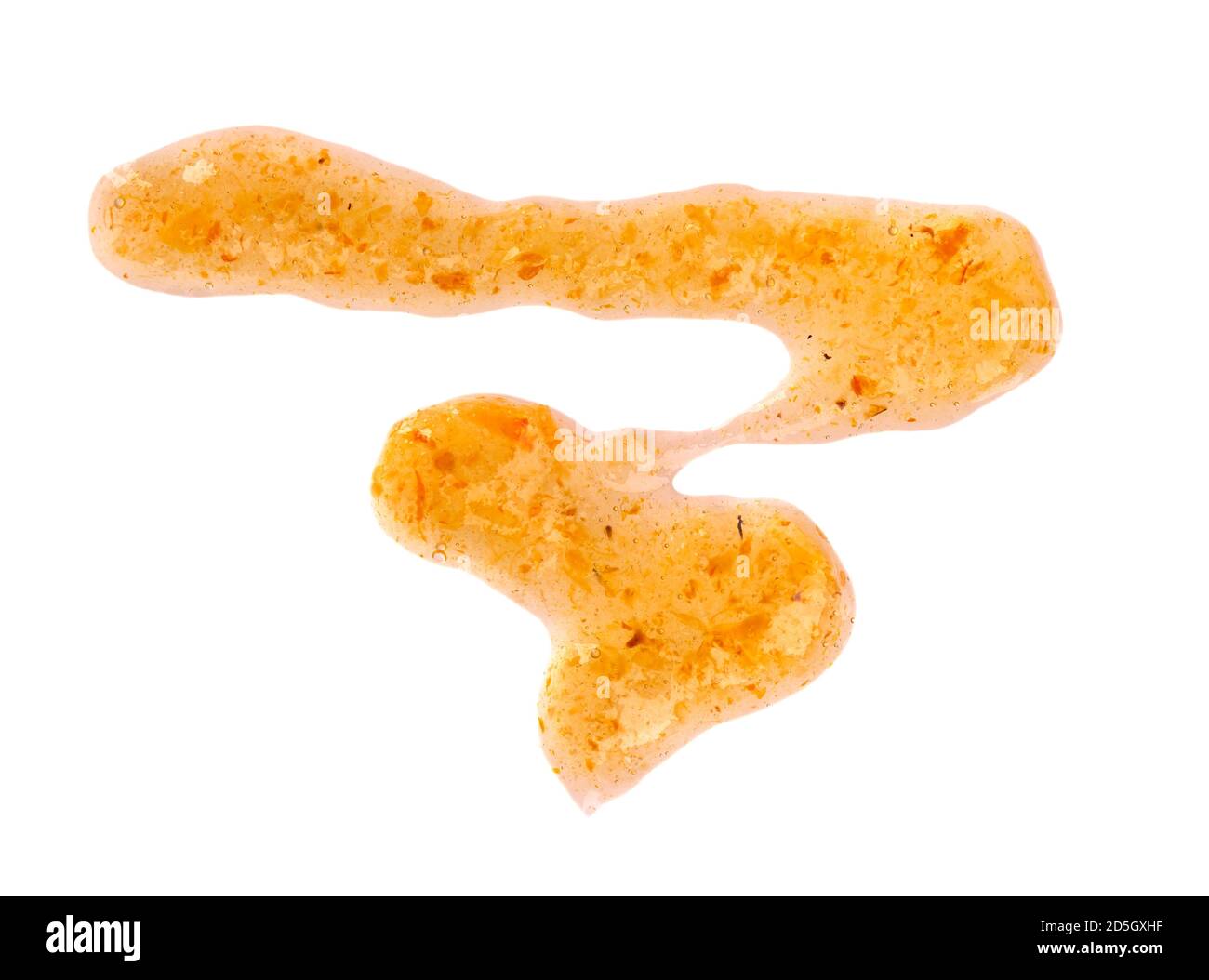 Arancione spessa marmellata di gocce, isolato su sfondo bianco. Marmellata di mandarini, confettura di fibbie marine, gocce di condimento. Vista dall'alto. Foto Stock