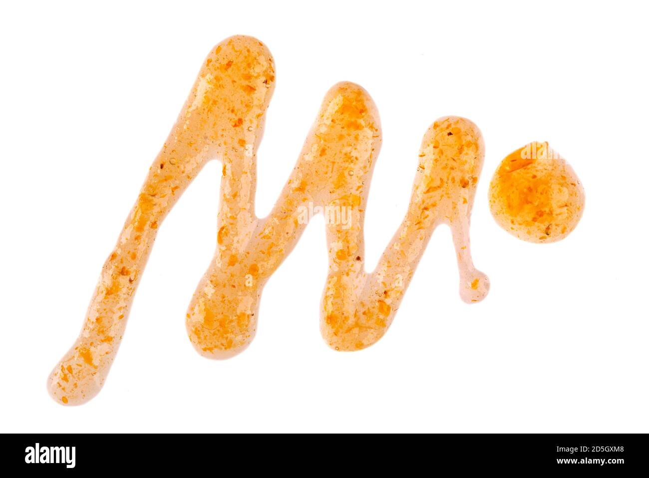 Arancione spessa marmellata di gocce, isolato su sfondo bianco. Marmellata di mandarini, confettura di fibbie marine, gocce di condimento. Vista dall'alto. Foto Stock